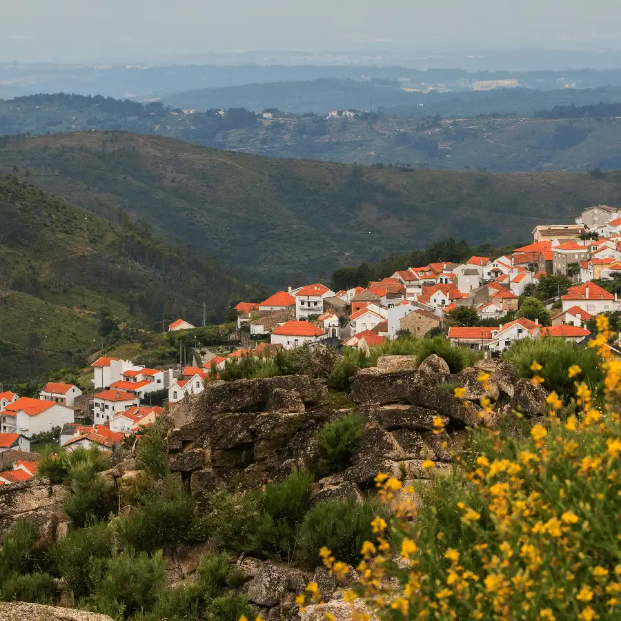 Valezim, Serra da Estrela, Portugal, mountain village, historic grocery store, 1907, natural park, hiking, skiing, scenic landscapes, authentic experience