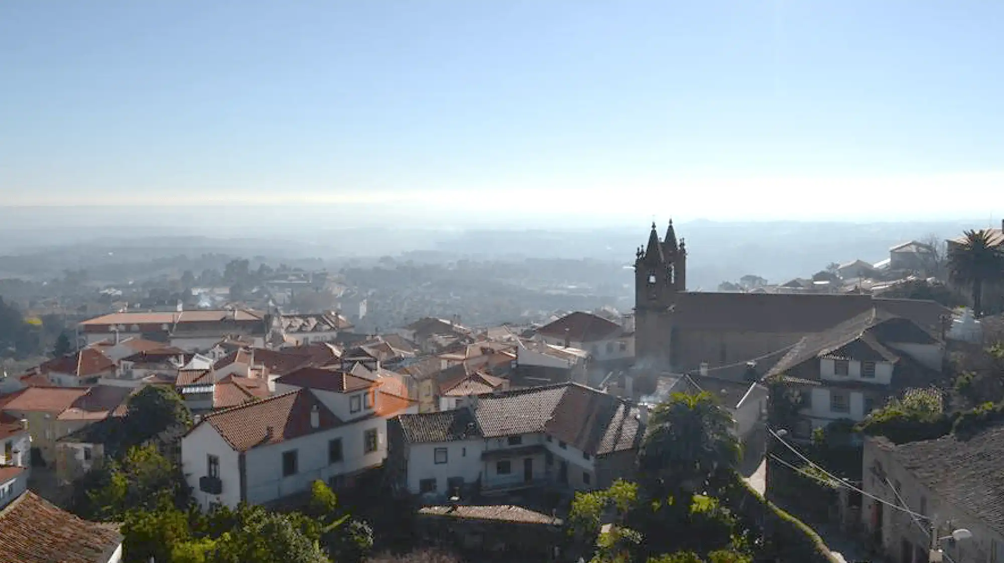 Alpedrinha's historic mansions and granite streets in a mountain setting