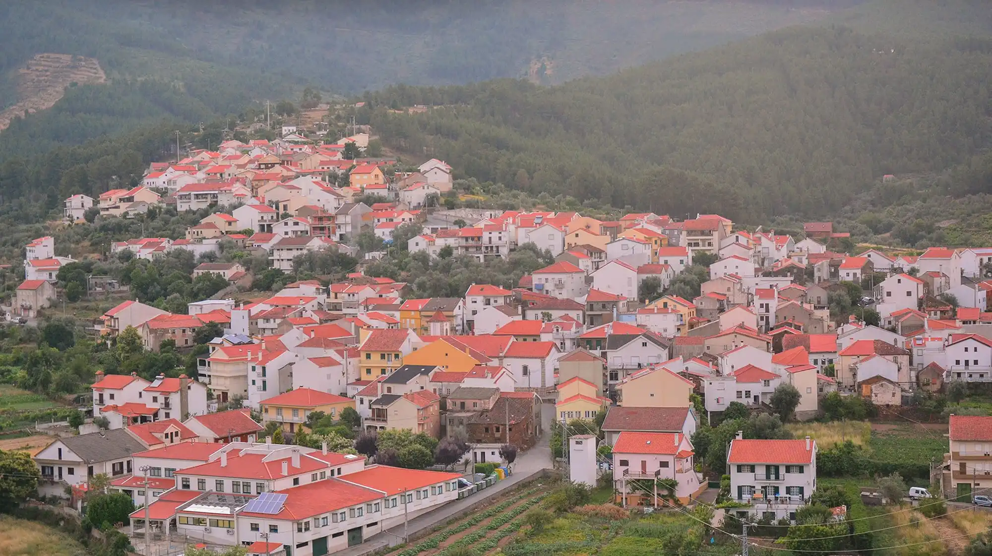 Verdelhos forest-framed village with mountain serenity and local crafts