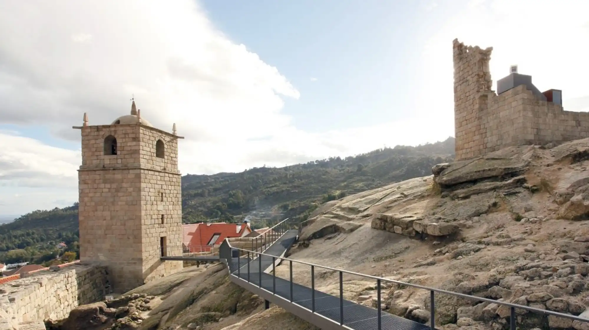 Mountain village Castelo Novo with stone houses and a castle tower